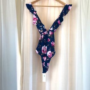 Floral crisscross one piece bathing suit